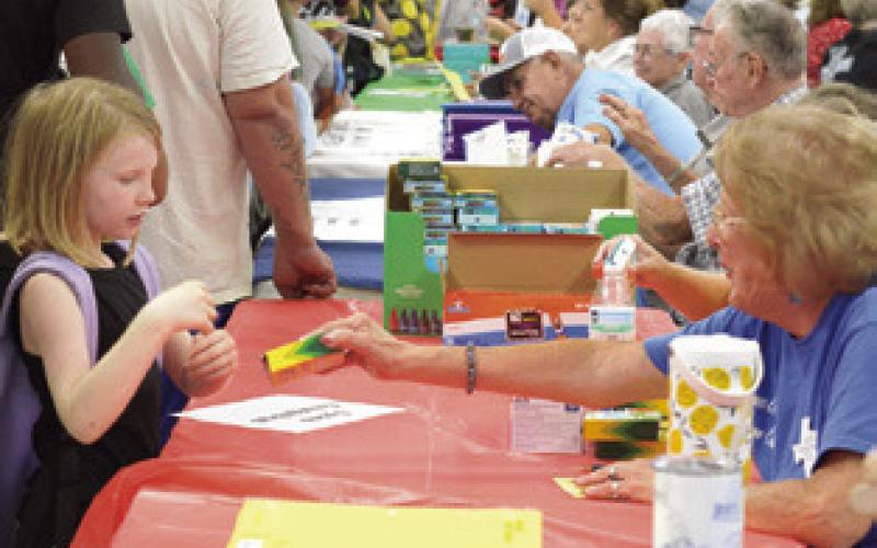 SEVERAL CHURCHES WERE on hand giving out school supplies to area students at last week’s Back to School Blast. Tribune photo by Denise Squier