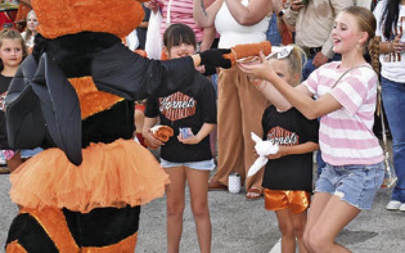 THE CALDWELL HORNETS mascot greets the crowd on Saturday night at Meet the Hornets in downtown Caldwell. Tribune photo by Roy Sanders