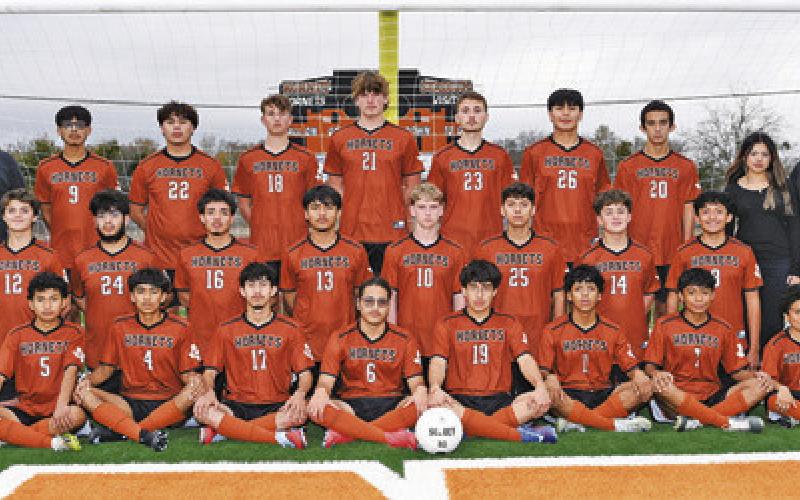 THE 2025-2026 VARSITY HORNET soccer team is, from left, front, Ivan Torres, Oscar Aldaba, Marcos Nunez, Francisco Vargas, Aksel Gutierrez, Eduardo Ramierez, Alberto Valdez, Josewa Aguilar, middle, Ryder Shahan, Cristian Lopez, Antonio Aguiilar, Christian Martinez, Matt Dutschke, Adrian Rojo, Jayce Williams, Jonathan Serna, back, Coach TJ Wolski, Eduardo Calderon, Reymon Leyva, Caleb Rackel, Tyler Boyd, Blake Taylor, Adrian Leyva, Elijah Valdez, Reina Hernandez and Coach Burt Yates.