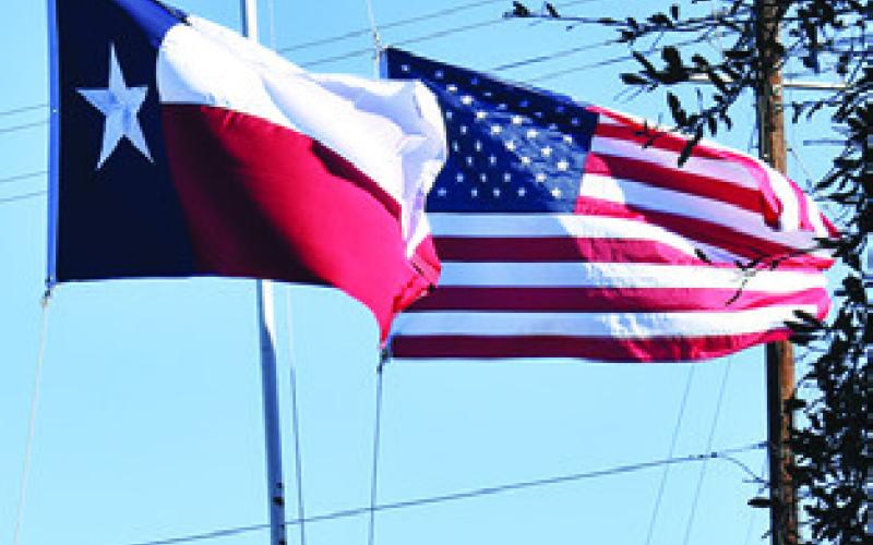 FLAGS ARE lowered at the Burleson County Sheriff’s Office and around Caldwell in honor of former U.S. President Jimmy Carter who recently died at the age of 100.