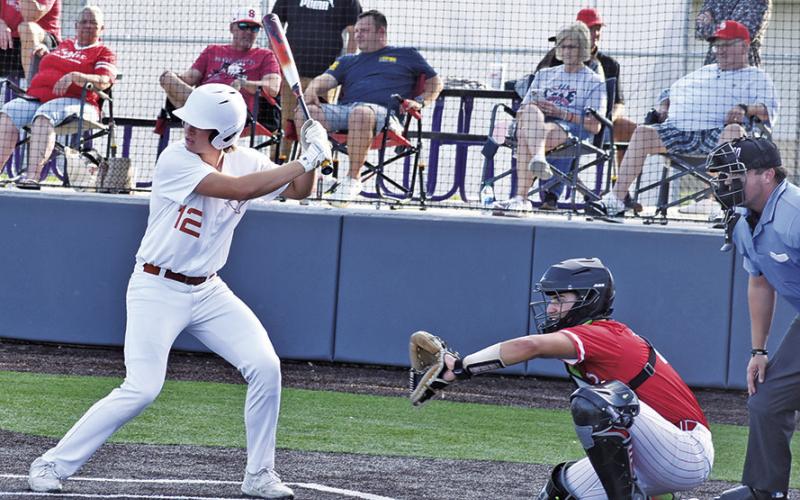 KOY MACIK OF Caldwell bats against Salado in the playoff game.