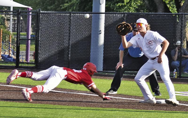 KOY MACIK GETS ready to catch the ball at first base against Salado. Tribune photo by Roy Sanders