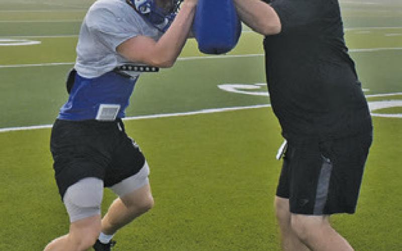 SNOOK PLAYERS work on fundamentals during practice getting ready for their Friday, Aug. 28 opener against Hull-Daisetta.