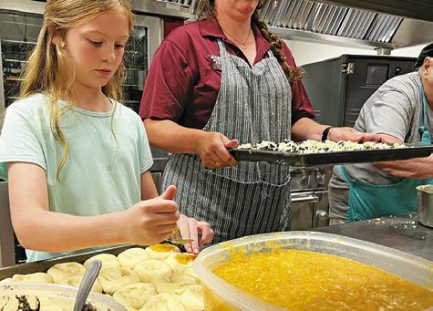 IT’S KOLACHE BAKING TIME! Snook students and adults attended the annual Kolache and Noodle School at the Snook Elementary School Cafeteria on Saturday, Aug. 24, learning to bake the Czech treats. Tribune photo by Denise Squier