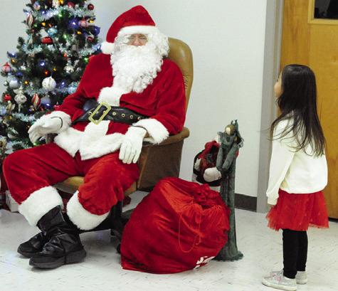 ST. BENEDICT KJT SOCIETY #100 sponsored “Breakfast with Santa” on Saturday at St. Mary Catholic Church’s Parish Activity Center. Santa sightings will continue this weekend with “Christmas on the Square,” “Breakfast with the Claus’” and “Santaville.” Tribune photo by Denise Squier