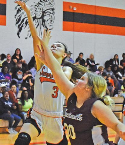 EMMA KOVASOVIC DRIVES for a layup during the Somerville-Fayetteville game last week. -- Tribune photo by Roy Sanders