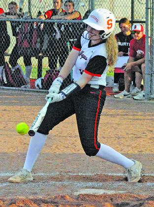 KYLIE NEUENDORFF makes contact with the ball during Somerville’s home game against Burton on Friday. Tribune photo by Denise Squier