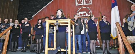 BURLESON COUNTY’S 4-H and FFA leaders gather on stage for the annual Ag breakfast at the Burleson County Cowboy Church. Tribune photo by Roy Sanders