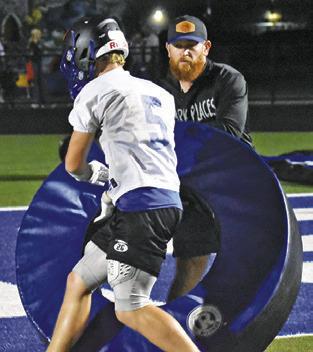 NOLAN LANHAM works with the football team during a fall 2025 practice session.