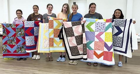 CREATIVE MEMORIES QUILT Guild recently held a youth camp and pictured above are the camper’s with their quilts. Pictured, from left, are Alexandra Ruiz, Elisa Brinck, Kathryn Schilling, Sawyer Vann, Emma Raymond, Ashlin Albright and Adelina Gallegos.