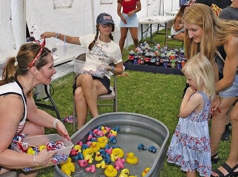 DUCKS IN THE tub is a children’s favorite every year at the July 3 celebration at Elizabeth Lutheran Church in Caldwell.