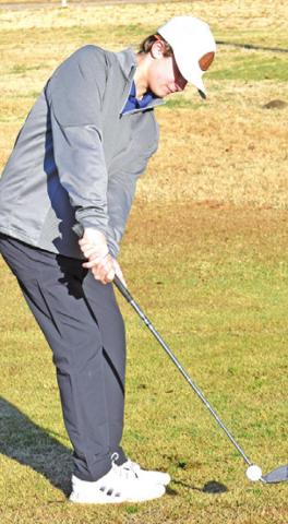 CADEN SCHLUENS of Snook warms up before the Caldwell Tournament on Monday.