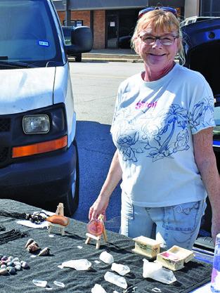 ROXANNE WALDEN of Roxy’s Rocks of Beaver Creek greets visitors on Saturday, Feb. 28, at the Farmers Market in Caldwell.