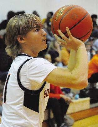 SOMERVILLE’S J.J. Moses shoots against Holland in the Yeguas’ 64-15 win. Tribune photo by Denise Squier