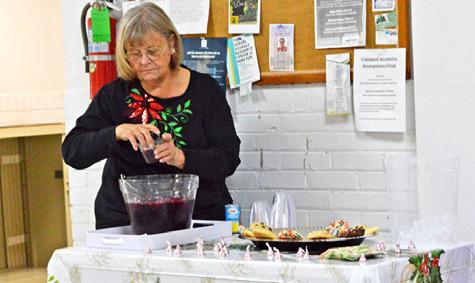 THE HISTORICAL COMMISSION offered snacks and refreshments at its Museum Open House on Friday, Dec. 19. Tribune photo by Sabine Lazo