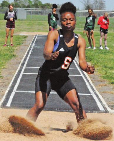 SOMERVILLE’S CAMIA Martin lands her jump during the girls’ District 26-2A long jump last week. -- Tribune photo by Denise Squier