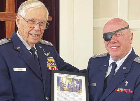 REV. PHINEAS JACOBUS (right), pastor of the First Presbyterian Church of Caldwell, was recently honored as the Auxiliary Chaplain of the Year at the graduation of class 25A of the Auxiliary Chaplain Course at the CAP Chaplain Corps College. Rev. George Klett (left) is also pictured.