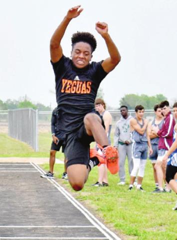 VERKOBE WOODBERRY of Somerville competes in the long jump at the district meet.