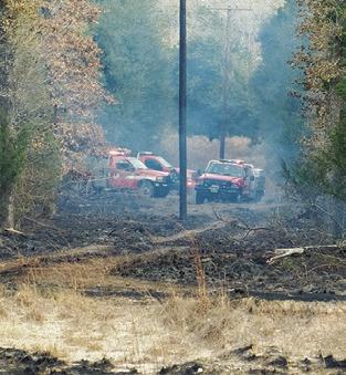 AREA FIREFIGHTERS respond to this fire near Yegua Creek Park in Washington County. Photo courtesy of Snook VFD