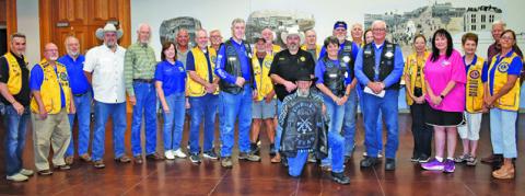 LIONS CLUB MEMBERS GATHER on Monday with members of Brazos Valley Thin Blue Line.
