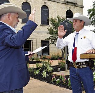 BILL RIOS is sworn in as Burleson County Sheriff by County Judge Keith Schroeder on Tuesday, June 10, at the courthouse.