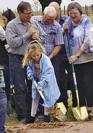 REV. DAVID JOHNSON leads the church service on Sunday at New Tabor Brethren Church. A groundbreaking for the new sanctuary was also held.