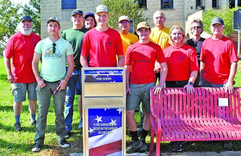 JOINING ALEX YORK, behind the flag retirement box, are front row, from left, John Alford, Jackson Berndt, Raschel York, Jim Berndt; back row, Scott York, Paul Johnson, Walker West, Russell Ramirez, Richard Johnson and David Fackler.