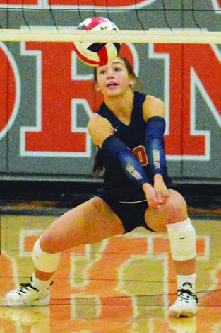 NATALIE EASTEPP lunges to bump the ball during the Lady Hornets’ win over Anderson-Shiro at home on Friday. Tribune photo by Kimberly Hutcheson