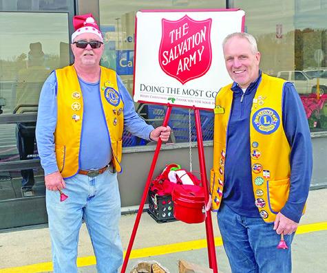 LIONS CLUB MEMBERS had a fun day recently ringing the Salvation Army Bell. Various members manned the kettle from 9 a.m. to 4:30 p.m. Pictured, from left, are Danny Jones and Kavon Novak.