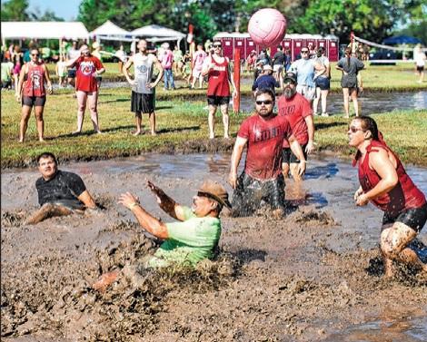 THE ANNUAL HOG Splash and mud volleyball tournament