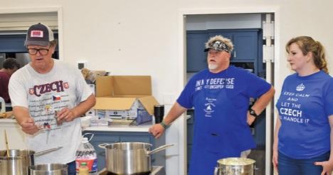 BRUNO SHIMEK ADDRESSES the crowd during this kolache making demonstration