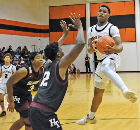 JA’KEITH DANIELS of Somerville grabs this pass on Thursday