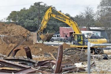 THE DIRT WORK portion of the city hall construction