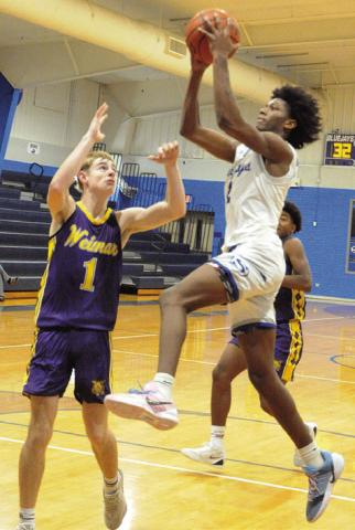 JIMMY KEARNEY OF Snook takes a shot against Weimar. The Bluejays won 52-35 to improve to 14-2 overall. Tribune photo by Denise Squier