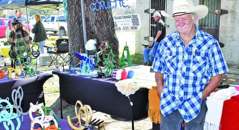 JACK MURPHY DISPLAYS his work from Jack’s Western Art on Sunday, March 2, at the Somerville Farmers Market.