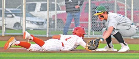 KAIN SANCHEZ GETS back on first base and is safe against Little River-Academy. -- Tribune photo by Roy Sanders