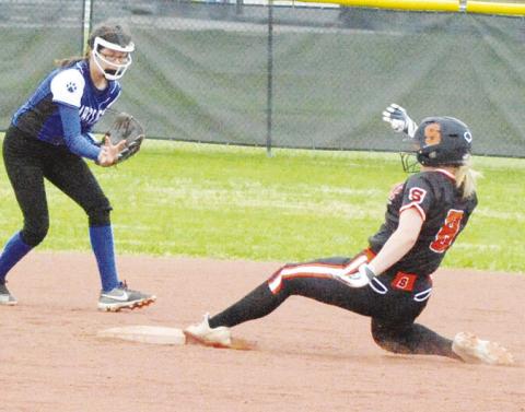SOMERVILLE’S JALYNN URBANOSKY slides into second base during the Somerville-Bartlett game at the Lady Yegua Softball Tournament last Friday morning at Lady Yegua Field. -- Tribune photo by Denise Squier