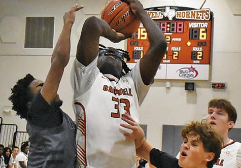 JAGOREAN HEWITT TAKES a shot on Thursday against Bryan JV in the first round of the Kolache Capital Tournament. Tribune photo by Roy Sanders