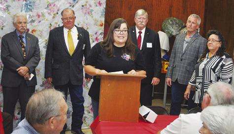 DANIELLE MIKULIN (CENTER) ACCEPTS grant checks from Masonic organizations on behalf of Haven Animal Rescue of Texas (HART). Also pictured are Jack Womack of Lee Scott Masonic Lodge in Somerville, Steve McCoy, H. Chip Green of the Texas Masonic Charities Foundation, Bryan Patton of Warren Masonic Lodge of Caldwell and Nikki Bilski of the Somerville Chapter of the Order of the Eastern Star.