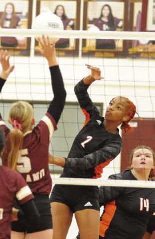 SOMERVILE’S RA’MAYA CARTER gets one of her 14 kills against Milano last Friday night. -- Tribune photo by Denise Squier