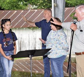 LOCAL PASTORS PRAY over students at Caldwell Intermediate School during National Day of Prayer celebration on Thursday, May 2, at the pavilion in Caldwell.