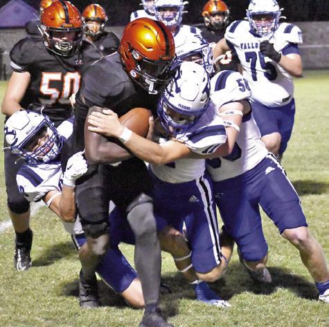 KEITH CRAWFORD OF Somerville carries the ball against Falls City. Somerville lost to the Beavers 33-22. -- Tribune photo by Roy Sanders