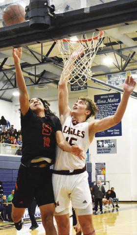 GARDNER SHIVERS of Somerville shoots against Milano. The Yeguas lost the area game 60-49. Tribune photo by Roy Sanders
