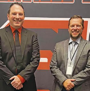 BEN PECK, left, was recently hired as Somerville ISD’s first Director of Communications and Marketing. Also pictured is Somerville ISD Superintendent Eric Holton.