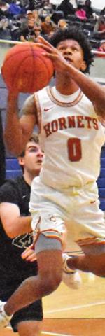 LARRY DAVIS takes a shot against Franklin in the Saturday playoff game in Bryan.