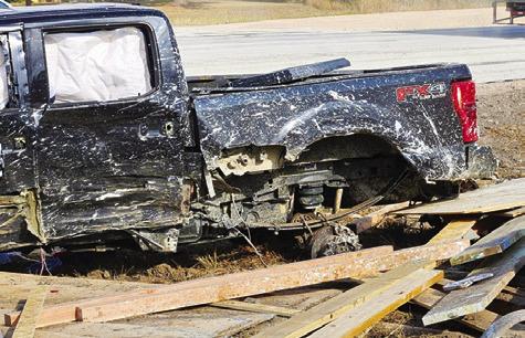 THIS FORD F-250 pickup was damaged in the Oct. 31 accident near the F.M. 60 East and F.M. 3058 intersection. Photo courtesy of Snook Volunteer Fire Department