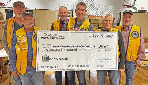 THE CALDWELL MEN’S Lions Club presented a $1,500 check to the Food for Families Food Drive. The club appreciates the local community who purchased raffle tickets helping to support area causes such as this. Pictured, from left, are Danny Jones, Donnie Cook, Kavon Novak, Tony and Sal Zaccagnino and Cody Chenault.