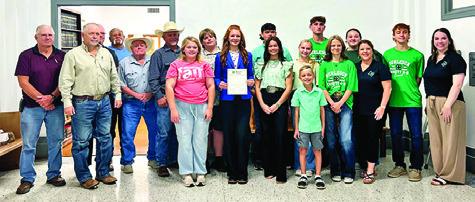 LOCAL 4-H PARTICIPANTS VISITED the Commissioners Court meeting on Monday, Sept. 22, to read a resolution declaring Oct. 5-11 National 4-H Week. Tribune photo by Sabine Lazo