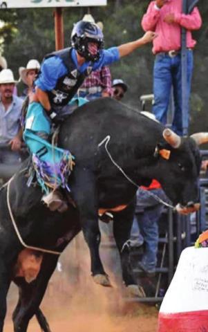 LANCE LARA COMPETES in the J-Rich Memorial Bull Riding Benefit where he received the highest marked score in the long round.
