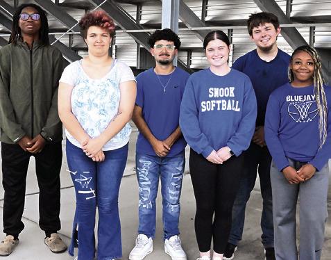 SNOOK HIGH SCHOOL recently announced its homecoming royalty. Pictured, from left, front, are queen hopefuls, Aeraellyne Adams, Kalyn Cooper and Braynija Pool, and, back, king hopefuls, John Carr, Conner Gillam and Jensen Weaver-Jakubik. Tribune photo by Denise Squier